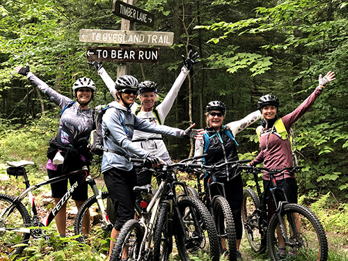 Women travelers biking in Vermont