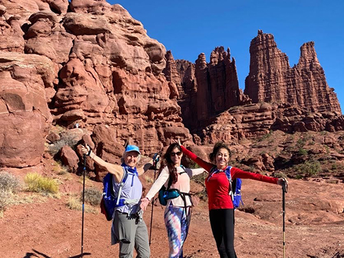 Women's Quest hiking on a yoga retreat Utah