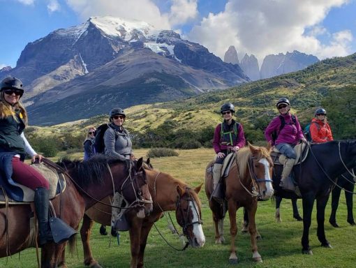 group of women horseback riding in Colorado