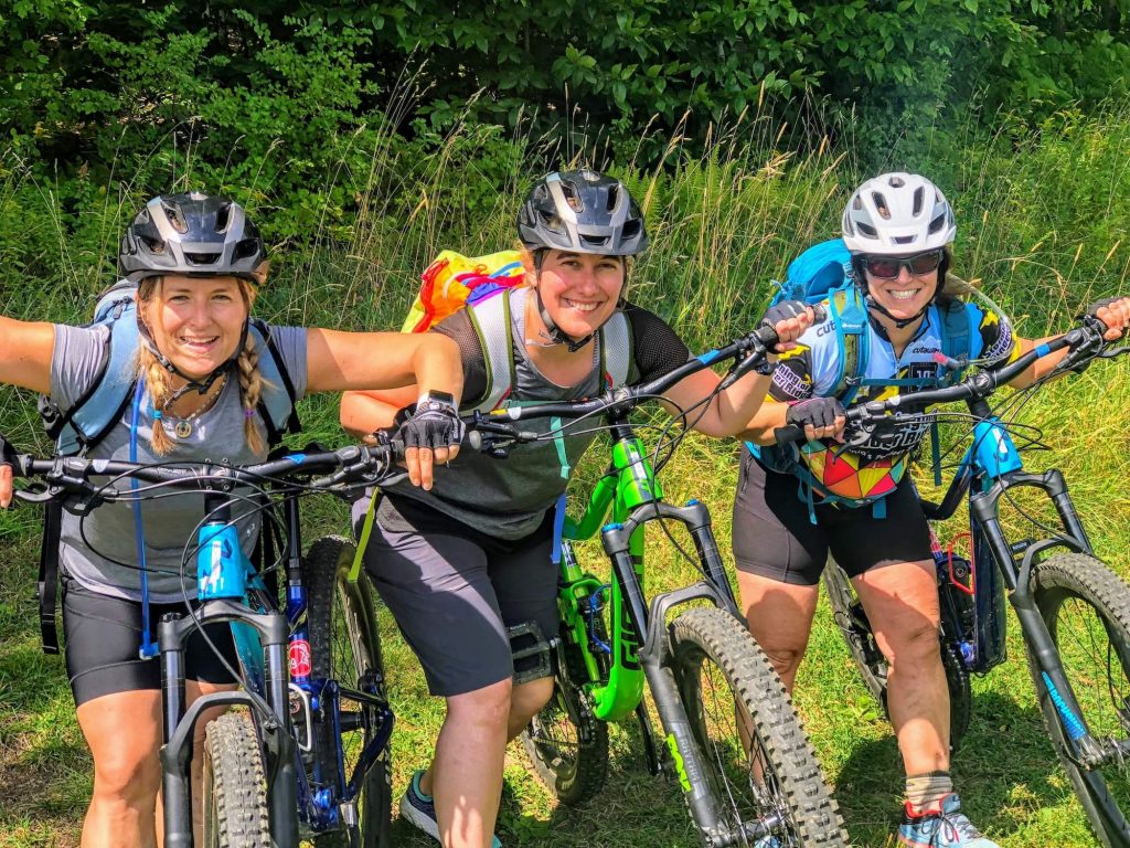 three women mountain bike riding in Colorado