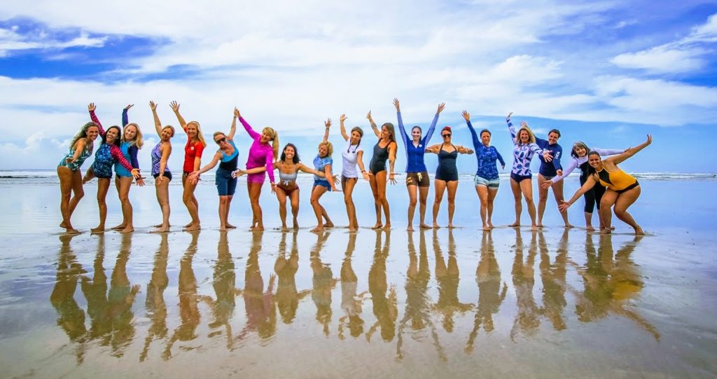 Women standing on a Costa Rica beach during a women's retreat