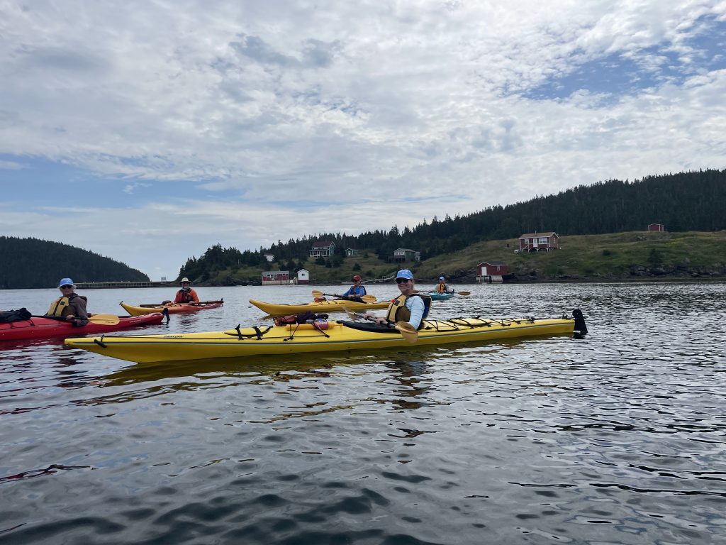 A gorup kayaking on the Newfoundland women's retreat.