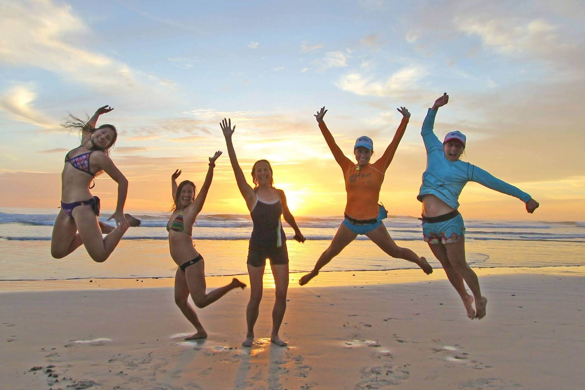 five women exploring a beach in Mexico