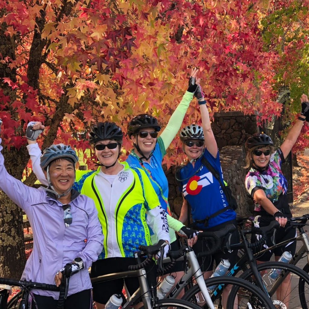 Women's wellness retreat bike riders